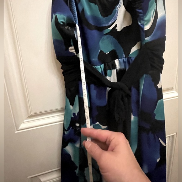 Black floral dress with rouched bodice and a black belt underneath.  Size 12. - Picture 6 of 7